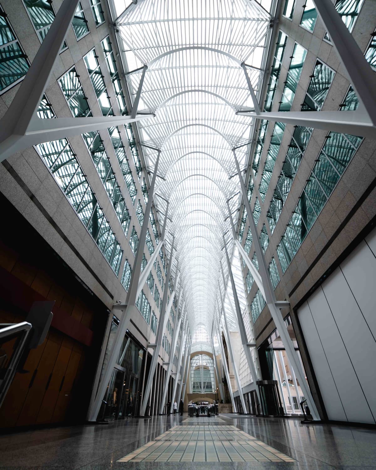 Looking down the length of the Allen Lambert Galleria in Toronto, with its soaring arched glass and steel ceiling